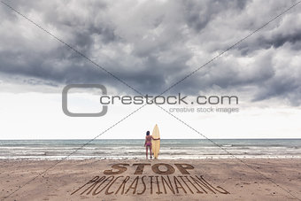 Composite image of calm woman in bikini with surfboard on beach