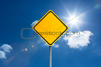 Composite image of yellow sign