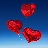 Composite image of love heart balloons