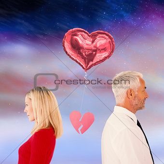 Composite image of couple not talking with broken heart between them