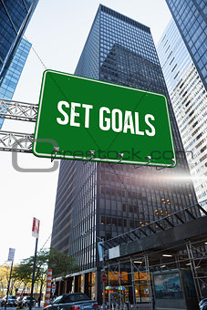 Set goals against skyscraper in city