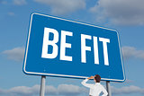 Be fit sign against sky