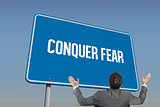 Conquer fear against blue sky