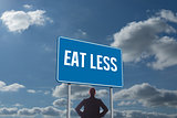 Eat less against sky and clouds