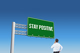 Stay positive against blue sky