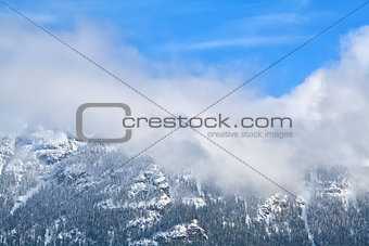 Mountains in snow and fog