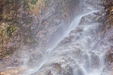 waterfall on alpine rocks