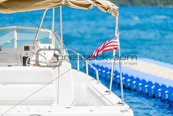 small sea yacht closeup with American flag