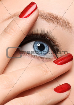 Glamour black arrow makeup close with fashion red nails