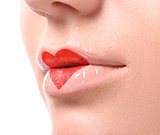 Lovely red make up at the heart shape on lips