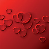 Heart shapes on the red background to the Valentine's day.