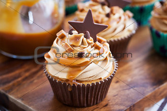 Cupcakes with cream cheese, caramel and chocolate