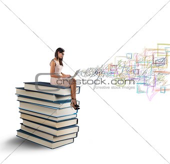 Laptop and books