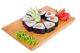delicious sushi on a wooden board on a white background
