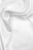 Smooth elegant white silk as background 
