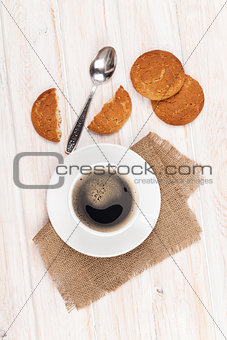 Coffee cup, gingerbread cookies and spoon