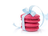 Red macarons with blue ribbon