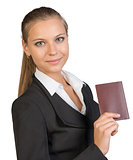 Businesswoman showing passport with blank cover