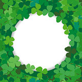 Background with a round frame of clovers