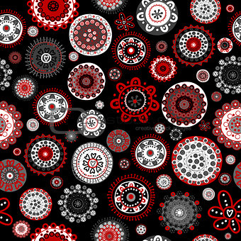 Seamless with doodle flowers over black background