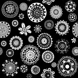 White doodle flowers over black background seamless pattern
