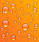 Clean water droplets on orange surface