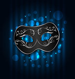 Carnival or theater mask on blue shimmering  background