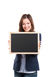 Business woman holding a chalkboard