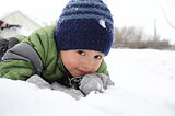 Boy portrait surrounded snow