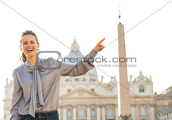 Happy young woman on piazza san pietro in vatican city state poi