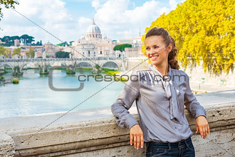 Portrait of happy young woman on bridge ponte umberto I with vie