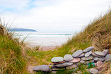 stone wall shelter on a beautiful Irish beach