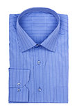 folded shirt with blue stripes on a white background