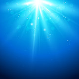 Blue background with sunlight