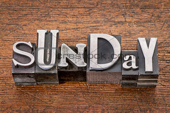 Sunday in metal type