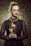 girl with dark baroque mask 
