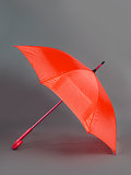 red umbrella on a gray background