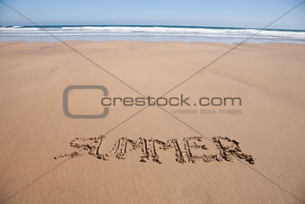 summer text in sand beach