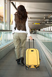 woman with vest at walkway airport