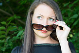 Portrait of young attractive girl with sunglasses