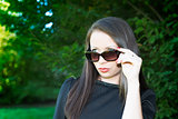 Portrait of young attractive girl with sunglasses