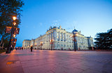 Royal palace with tourists on a spring night in Madrid