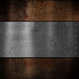 Metal plate on grunge background