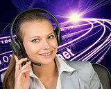 Closeup of businesswoman in headset, wire-frame building with light as backfrop