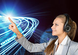 Businesswoman in headset touching or pressing something