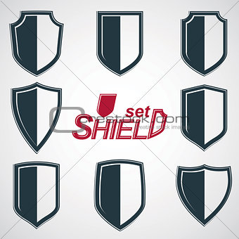 Collection of vector grayscale defense shields, protection design graphic elements. High quality heraldic illustrations on security theme, set of retro coat of arms. EPS8