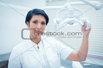 Confident female dentist
