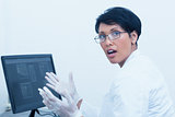 Female dentist with x-ray on computer