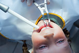 Close up of girl having her teeth examined