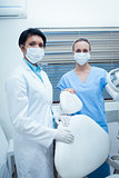 Female dentists wearing surgical masks
